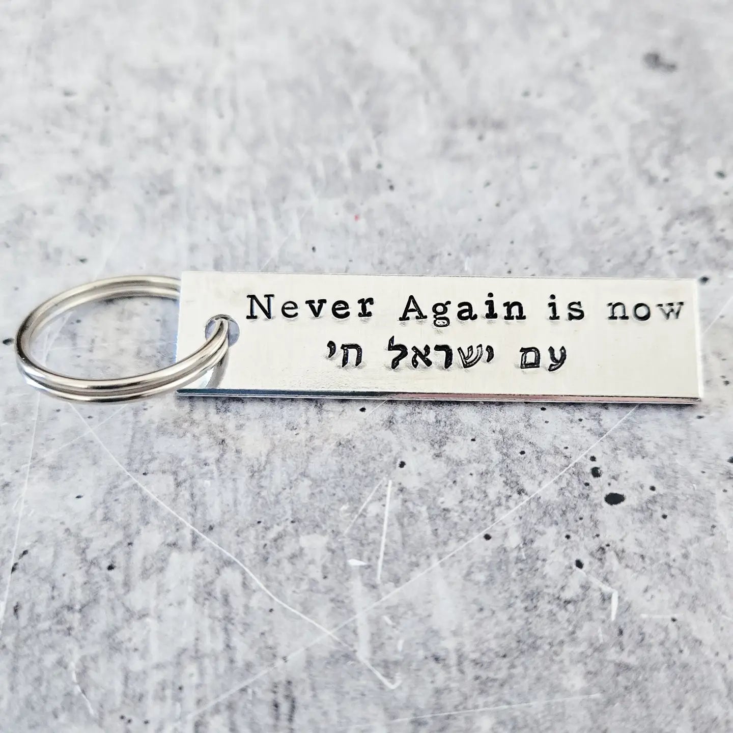 Never Again Is Now Silver Aluminum Keychain